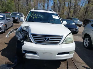 2007 Lexus GX with VIN JTJBT20X570144529, listed as a IAAI auction lot 42035412 with 265,886 mi miles. Bid and sale history available at carsss.com. Image 12.