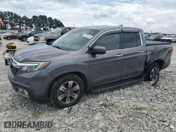2019 Honda Ridgeline RTL-E with VIN 5FPYK3F77KB005131, listed as a Copart auction lot 60726155 with 81,797 mi miles and Salvage title. Bid and sale history available at DreamBid. Image 1.