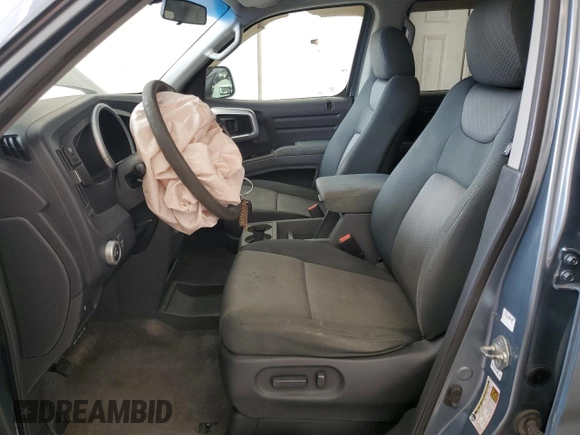 2007 Honda Ridgeline RTS z VIN 2HJYK16467H514031, wystawiony jako Copart lot #57571865 z przebiegiem 298 895 mil mil oraz Szkoda całkowita • Salvage title. Historia ofert i sprzedaży dostępna na DreamBid. Obrazek 7.
