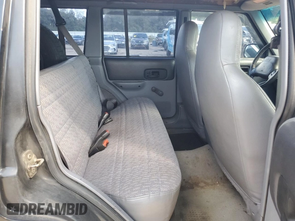 1997 Jeep Cherokee SE with VIN 1J4FJ28S6VL563756, listed as a Copart auction lot 74795074 with 196,118 mi miles and Salvage Title. Bid and sale history available at carsss.com. Image 12.