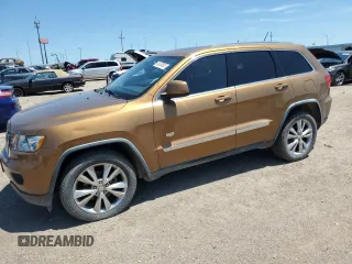 2011 Jeep Grand Cherokee Laredo with VIN 1J4RR4GG3BC646300, listed as a Copart auction lot 62633835 with 165,135 mi miles and Clean title. Bid and sale history available at DreamBid. Image 1.