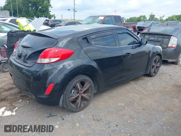 2013 Hyundai Veloster w/Black Int с VIN KMHTC6ADXDU084704, выставлен на аукционе IAAI как лот 42443297 с пробегом 111 587 миль миль и . История ставок и продаж доступна на DreamBid. Изображение 4.