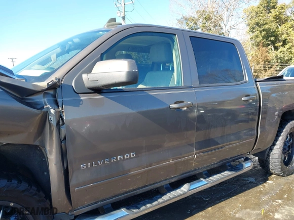 2015 Chevrolet Silverado 1500 LT with VIN 3GCUKREC9FG517787, listed as a IAAI auction lot 41400803 with 254,489 mi miles. Bid and sale history available at carsss.com. Image 14.