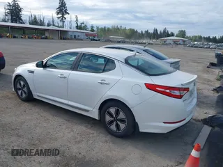 2012 Kia Optima Hybrid with VIN KNAGM4AD9C5011658, listed as a IAAI auction lot 42197129 with 142,977 mi miles. Bid and sale history available at carsss.com. Image 3.