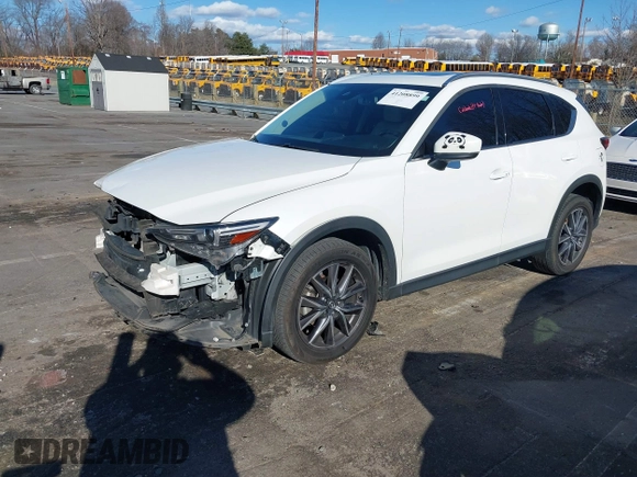 2018 Mazda CX-5 Grand Touring with VIN JM3KFBDM6J0435579, listed as a IAAI auction lot 41208899 with 131,212 mi miles. Bid and sale history available at carsss.com. Image 18.
