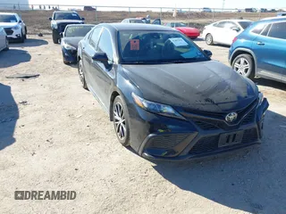 2023 Toyota Camry SE z VIN 4T1G11AKXPU751817, wystawiony jako IAAI lot #41405960 z przebiegiem 39 801 mil mil oraz . Historia ofert i sprzedaży dostępna na DreamBid. Obrazek 1.