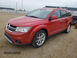 2014 Dodge Journey R/T with VIN 3C4PDDFG7ET228103, listed as a Copart auction lot 65729925 with 239,978 mi miles and Salvage title. Bid and sale history available at DreamBid. Image 1.