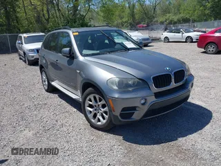 2011 BMW X5 35i z VIN 5UXZV4C5XBL410778, wystawiony jako IAAI lot #42229480 z przebiegiem 103 415 mil mil oraz . Historia ofert i sprzedaży dostępna na DreamBid. Obrazek 1.
