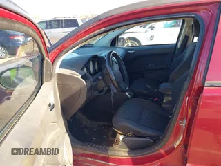 2008 Dodge Caliber SE with VIN 1B3HB28C78D660078, listed as a IAAI auction lot 40999360 with 174,027 mi miles. Bid and sale history available at carsss.com. Image 5.