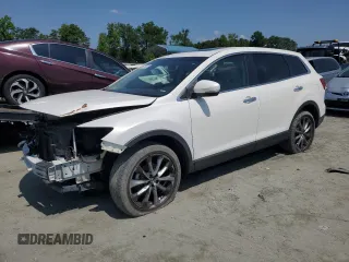 2015 Mazda CX-9 Grand Touring z VIN JM3TB2DA3F0452160, wystawiony jako Copart lot #60220655 z przebiegiem 145 185 mil mil oraz Szkoda całkowita • Salvage title. Historia ofert i sprzedaży dostępna na DreamBid. Obrazek 1.