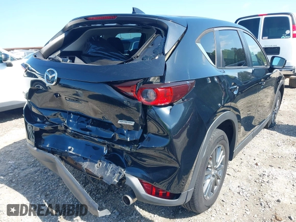 2017 Mazda CX-5 Touring z VIN JM3KFBCL0H0209458, wystawiony jako IAAI lot #42169599 z przebiegiem 93 287 mil mil oraz . Historia ofert i sprzedaży dostępna na DreamBid. Obrazek 4.