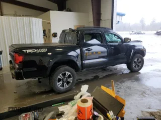 2019 Toyota Tacoma SR z VIN 5TFCZ5AN1KX196812, wystawiony jako Copart lot #51372065 z przebiegiem Nie podano mil oraz Szkoda całkowita • Salvage title. Historia ofert i sprzedaży dostępna na DreamBid. Obrazek 3.