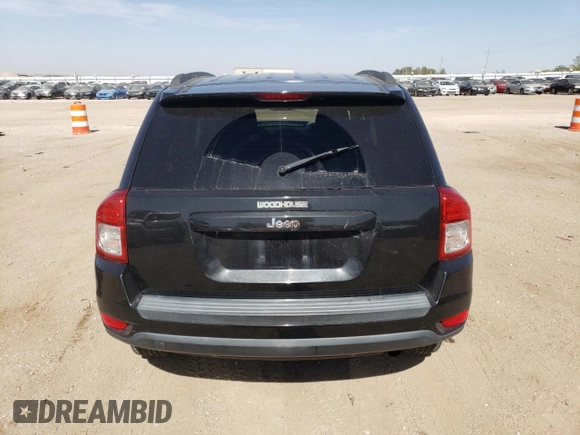 2011 Jeep Compass with VIN 1J4NT1FA4BD159872, listed as a Copart auction lot 74118834 with 142,660 mi miles and Salvage Title. Bid and sale history available at carsss.com. Image 6.