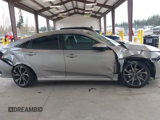 2021 Honda Civic Sport with VIN 2HGFC2F83MH521470, listed as a IAAI auction lot 41828890 with 49,703 mi miles and . Bid and sale history available at DreamBid. Image 13.