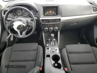 2016 Mazda CX-5 Touring with VIN JM3KE2CYXG0777715, listed as a Copart auction lot 52157005 with 58,585 mi miles and Salvage Title. Bid and sale history available at carsss.com. Image 8.