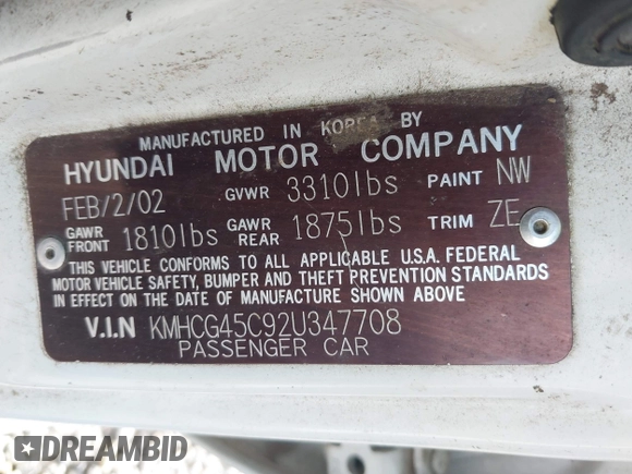 2002 Hyundai Accent GL with VIN KMHCG45C92U347708, listed as a IAAI auction lot 42137086 with 73,271 mi miles. Bid and sale history available at carsss.com. Image 9.