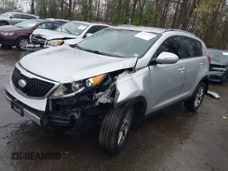 2014 Kia Sportage LX with VIN KNDPB3AC4E7582430, listed as a IAAI auction lot 41947229 with 140,680 mi miles. Bid and sale history available at carsss.com. Image 2.