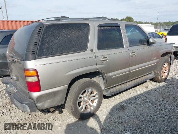 2001 Chevrolet Tahoe LS z VIN 1GNEC13T51R154488, wystawiony jako IAAI lot #41519004 z przebiegiem 400 208 mil mil oraz . Historia ofert i sprzedaży dostępna na DreamBid. Obrazek 4.