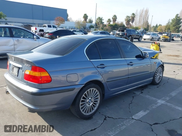 2003 BMW 3 Series 330i with VIN WBAEV53453KM03321, listed as a IAAI auction lot 41134433 with 186,586 mi miles. Bid and sale history available at carsss.com. Image 4.