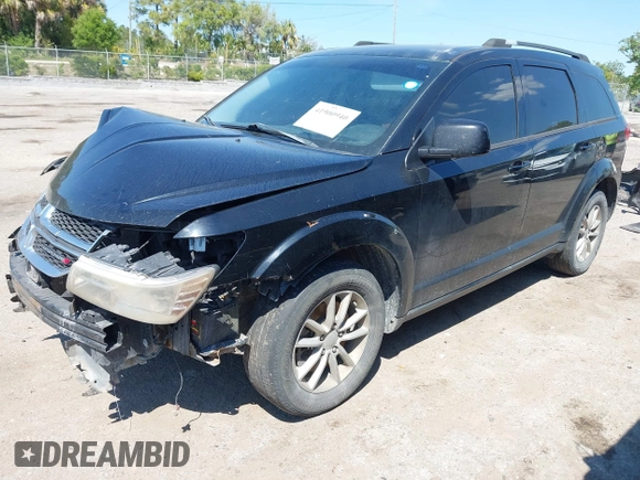 2014 Dodge Journey SXT with VIN 3C4PDCBG5ET250732, listed as a IAAI auction lot 41900940 with 144,301 mi miles. Bid and sale history available at carsss.com. Image 2.