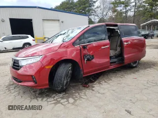 2023 Honda Odyssey Elite z VIN 5FNRL6H97PB041855, wystawiony jako Copart lot #48977835 z przebiegiem 15 595 mil mil oraz Szkoda całkowita • Salvage title. Historia ofert i sprzedaży dostępna na DreamBid. Obrazek 1.