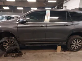 2022 Honda Pilot EX-L with VIN 5FNYF6H59NB000754, listed as a IAAI auction lot 42090576 with 32,813 mi miles and . Bid and sale history available at DreamBid. Image 14.