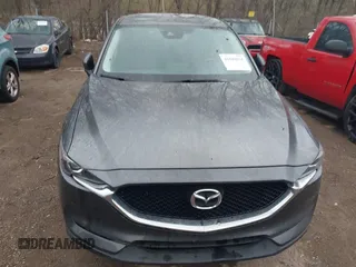 2017 Mazda CX-5 Touring with VIN JM3KFACL3H0148312, listed as a IAAI auction lot 41844634 with 68,534 mi miles and . Bid and sale history available at carsss.com. Image 12.