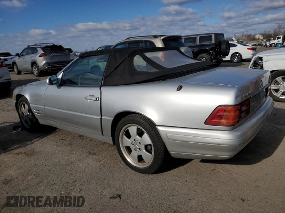 1999 Mercedes-Benz SL-Class with VIN WDBFA68F8XF175735, listed as a Copart auction lot 41658525 with 144,177 mi miles and Salvage Title. Bid and sale history available at carsss.com. Image 2.