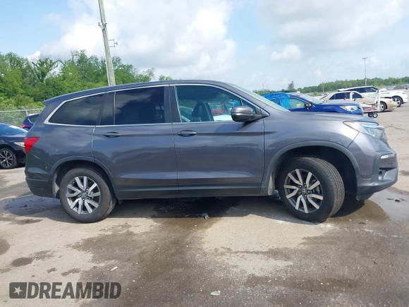 2019 Honda Pilot EX-L with VIN 5FNYF5H52KB039336, listed as a IAAI auction lot 42108456 with 220,307 mi miles and . Bid and sale history available at carsss.com. Image 13.