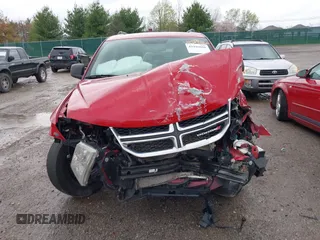 2017 Dodge Journey SE z VIN 3C4PDCAB2HT558628, wystawiony jako IAAI lot #41946060 z przebiegiem 217 810 mil mil oraz . Historia ofert i sprzedaży dostępna na DreamBid. Obrazek 13.