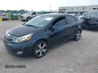 2013 Kia Rio EX with VIN KNADN4A39D6271075, listed as a IAAI auction lot 42684197 with 136,099 mi miles and . Bid and sale history available at DreamBid. Image 2.