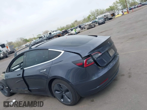 2020 Tesla Model 3 Long Range with VIN 5YJ3E1EB1LF639055, listed as a IAAI auction lot 42048009 with 43,493 mi miles. Bid and sale history available at carsss.com. Image 14.