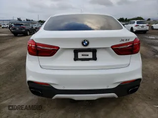 2018 BMW X6 xDrive50i with VIN 5UXKU6C51J0W38863, listed as a Copart auction lot 73083632 with 59,290 mi miles. Bid and sale history available at carsss.com. Image 6.