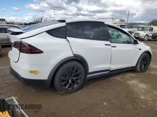2022 Tesla Model X with VIN 7SAXCAE59NF358337, listed as a Copart auction lot 48262775 with Not Provided miles and Salvage Title. Bid and sale history available at DreamBid. Image 3.