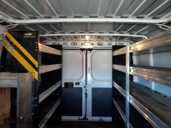 2023 Ram ProMaster Cargo with VIN 3C6LRVVG5PE527224, listed as a Copart auction lot 77179234 with 33,804 mi miles and Salvage Title. Bid and sale history available at DreamBid. Image 10.