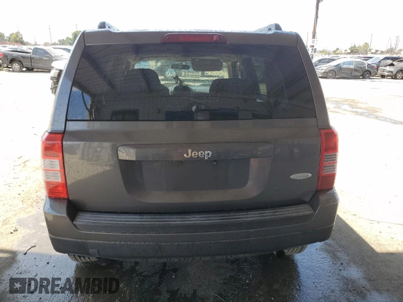 2014 Jeep Patriot Latitude with VIN 1C4NJPFB9ED822901, listed as a Copart auction lot 51005655 with 130,149 mi miles and Salvage Title. Bid and sale history available at carsss.com. Image 6.