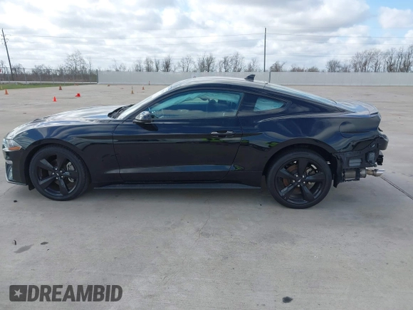 2021 Ford Mustang EcoBoost z VIN 1FA6P8TH2M5140071, wystawiony jako IAAI lot #41775674 z przebiegiem 20 184 mil mil oraz . Historia ofert i sprzedaży dostępna na DreamBid. Obrazek 14.