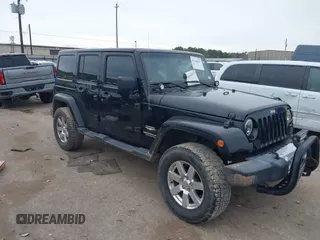 2015 Jeep Wrangler Unlimited Sahara with VIN 1C4BJWEGXFL501676, listed as a IAAI auction lot 41364665 with 110,845 mi miles. Bid and sale history available at carsss.com. Image 1.