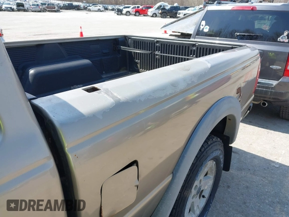 2003 Ford Ranger XL Fleet with VIN 1FTZR45EX3TA42560, listed as a IAAI auction lot 42043472 with 106,051 mi miles and . Bid and sale history available at carsss.com. Image 6.