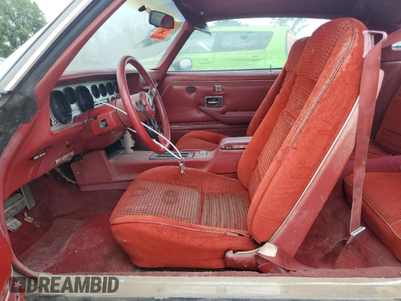 1980 Pontiac Firebird with VIN 2V87TAL116556, listed as a Copart auction lot 64086644 with 15,342 mi miles and Salvage title. Bid and sale history available at DreamBid. Image 7.