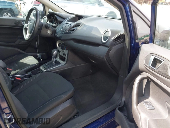 2016 Ford Fiesta SE with VIN 3FADP4EJ4GM199945, listed as a IAAI auction lot 41881260 with 98,945 mi miles. Bid and sale history available at carsss.com. Image 5.