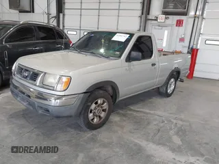 1998 Nissan Frontier XE with VIN 1N6DD21S9WC331083, listed as a IAAI auction lot 42202743 with 205,221 mi miles and . Bid and sale history available at DreamBid. Image 2.
