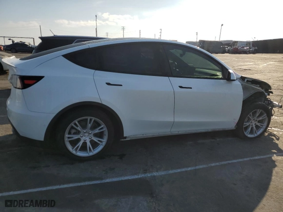 2021 Tesla Model Y Long Range with VIN 5YJYGAEE0MF251598, listed as a Copart auction lot 42151475 with 64,459 mi miles and Salvage Title. Bid and sale history available at carsss.com. Image 3.