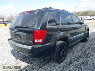 2005 Jeep Grand Cherokee Laredo with VIN 1J4GS48K05C511231, listed as a IAAI auction lot 41737924 with 179,411 mi miles. Bid and sale history available at carsss.com. Image 4.