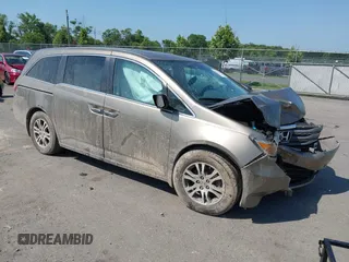 2012 Honda Odyssey EX-L with VIN 5FNRL5H67CB123398, listed as a IAAI auction lot 42562955 with 245,000 mi miles and . Bid and sale history available at DreamBid. Image 1.