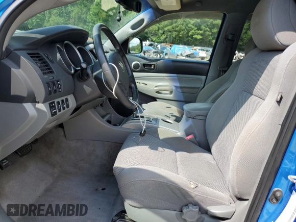 2009 Toyota Tacoma with VIN 3TMLU42N39M021727, listed as a Copart auction lot 65031095 with 200,386 mi miles and Salvage title. Bid and sale history available at DreamBid. Image 7.
