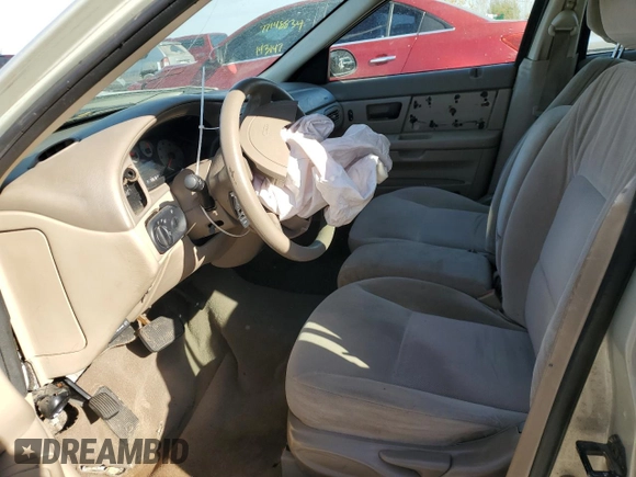 2004 Mercury Sable z VIN 1MEFM58UX4A612059, wystawiony jako Copart lot #77181894 z przebiegiem Nie podano mil oraz Czysty tytuł • Clean title. Historia ofert i sprzedaży dostępna na DreamBid. Obrazek 7.