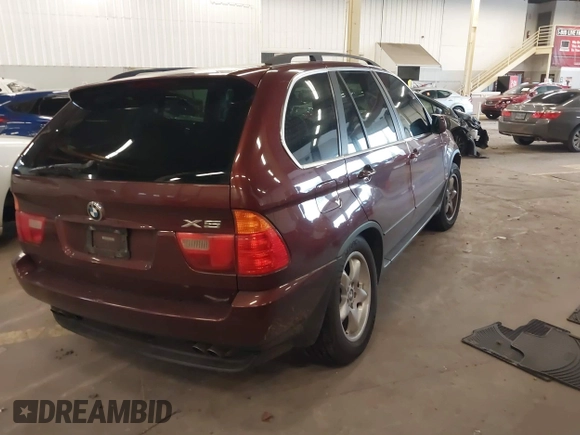 2001 BMW X5 4.4i with VIN WBAFB33561LH24532, listed as a IAAI auction lot 41611503 with 188,671 mi miles. Bid and sale history available at carsss.com. Image 4.