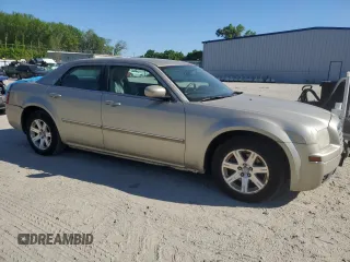2006 Chrysler 300 Touring with VIN 2C3KA53G56H245851, listed as a Copart auction lot 52883105 with 166,410 mi miles and Salvage Title. Bid and sale history available at carsss.com. Image 4.