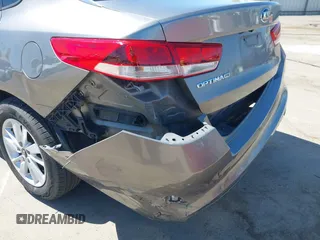 2016 Kia Optima LX with VIN 5XXGT4L36GG098804, listed as a IAAI auction lot 42772231 with 206,471 mi miles and . Bid and sale history available at DreamBid. Image 18.